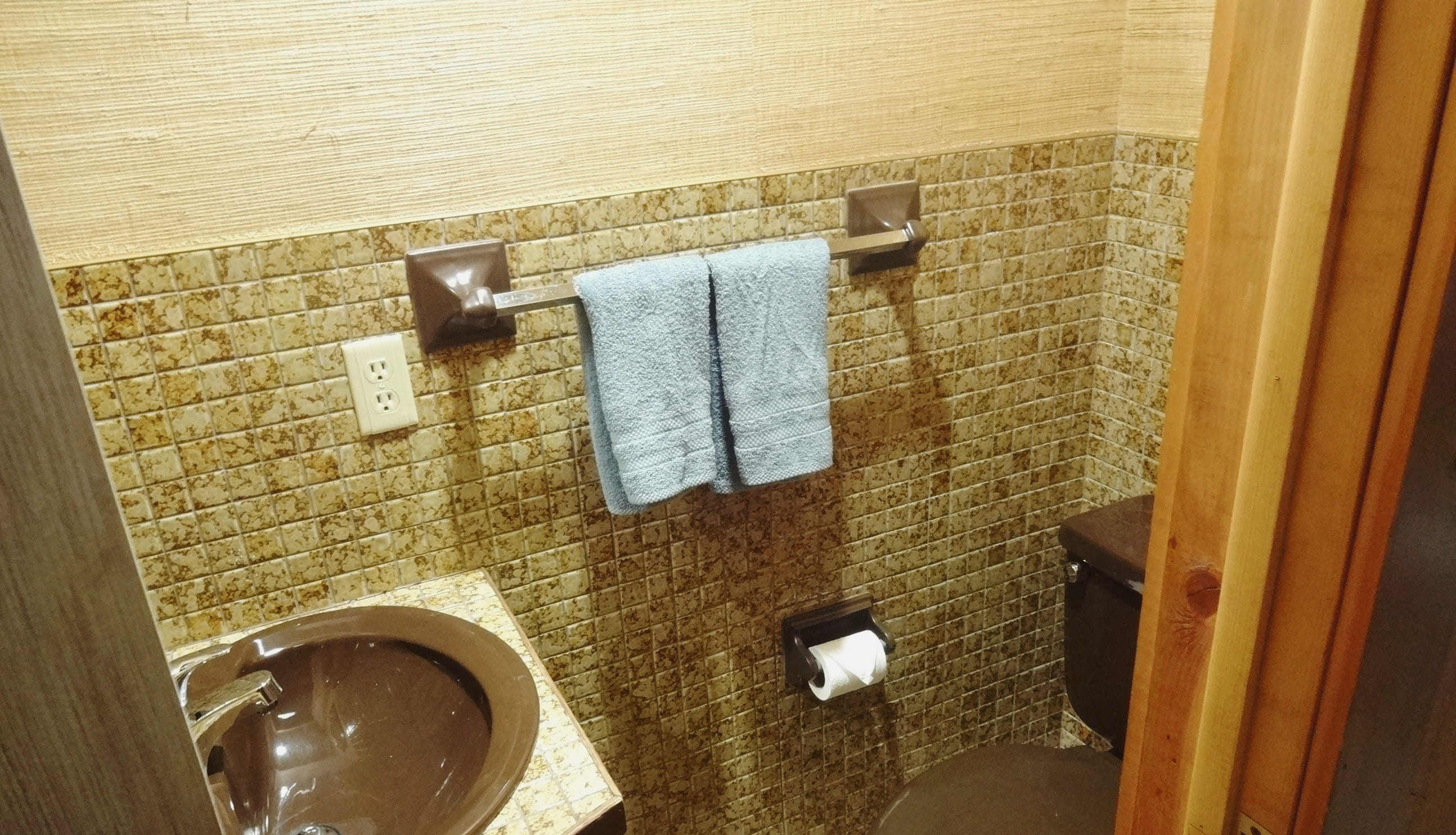 Half Bathroom. Near entryway.